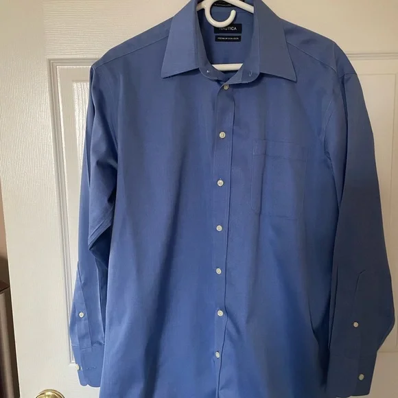 Nautica mens dress shirt. Solid blue. Nautica mens dress shirt. Solid blue.
